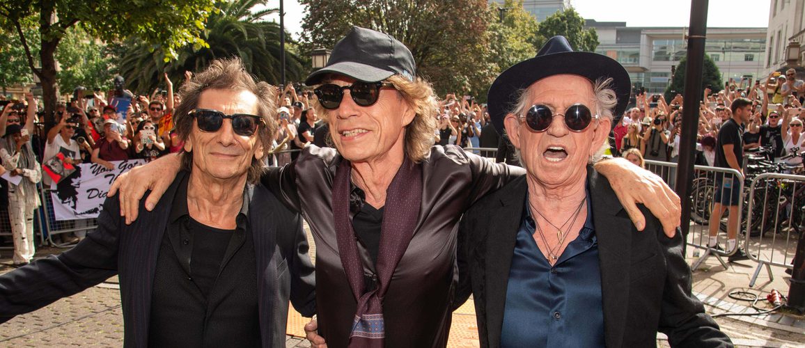 A photo of The Rolling Stones outside of Hackney Empire.
