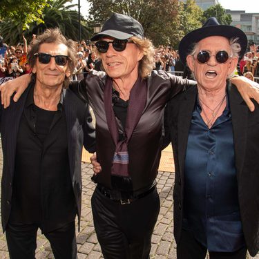 A photo of The Rolling Stones outside of Hackney Empire.