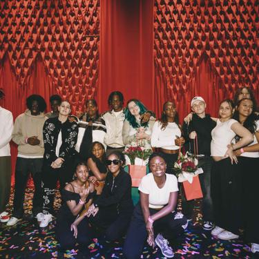 Group image of all the finalist that participated at Alter Ego 2024 with the red curtain as the background