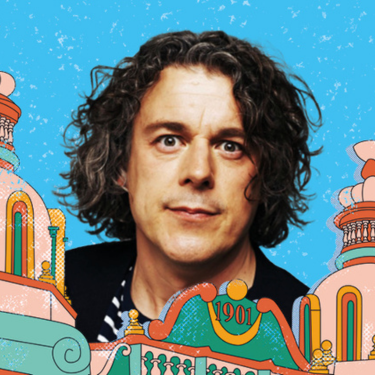 A photo of Alan Davies set against an illustration of Hackney Empire and the sky.