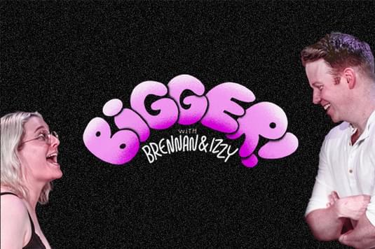 Brennan and Izzy are on standing either side of the image against a black background with the title 'Bigger' written in big pink letters.