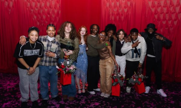 A group photo of all of the finalists of Alter Ego 2025 positioned against a red curtain