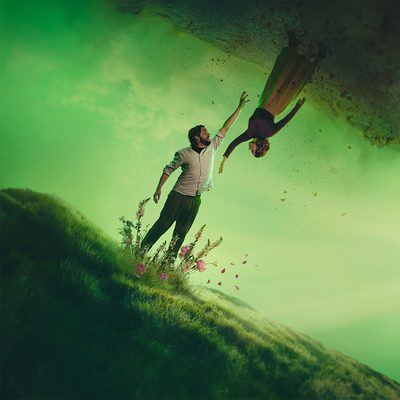 ORPHEUS AND EURYDICE reach toward each other from the underworld and overworld, torn apart