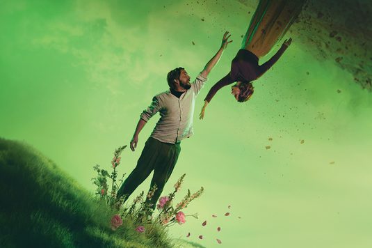 ORPHEUS AND EURYDICE reach toward each other from the underworld and overworld, torn apart