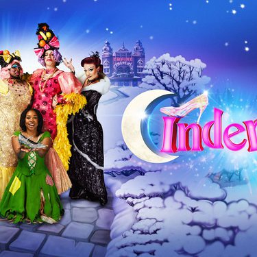 The final cast artwork for Cinderella with the Fairy Godmother, the Ugly Sisters, Cinderella and the Wicked Stepmother posing together against a snowy background with Hackney Empire behind them.