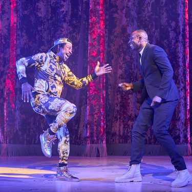 Billy Goose and Jack Goose are stood side by side almost in a running position facing each other